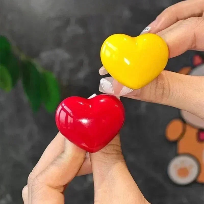 Botón de inodoro corazón