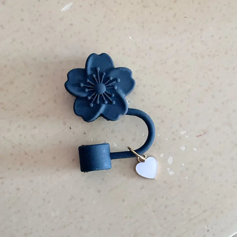 Protector de cañita flor negra dije
