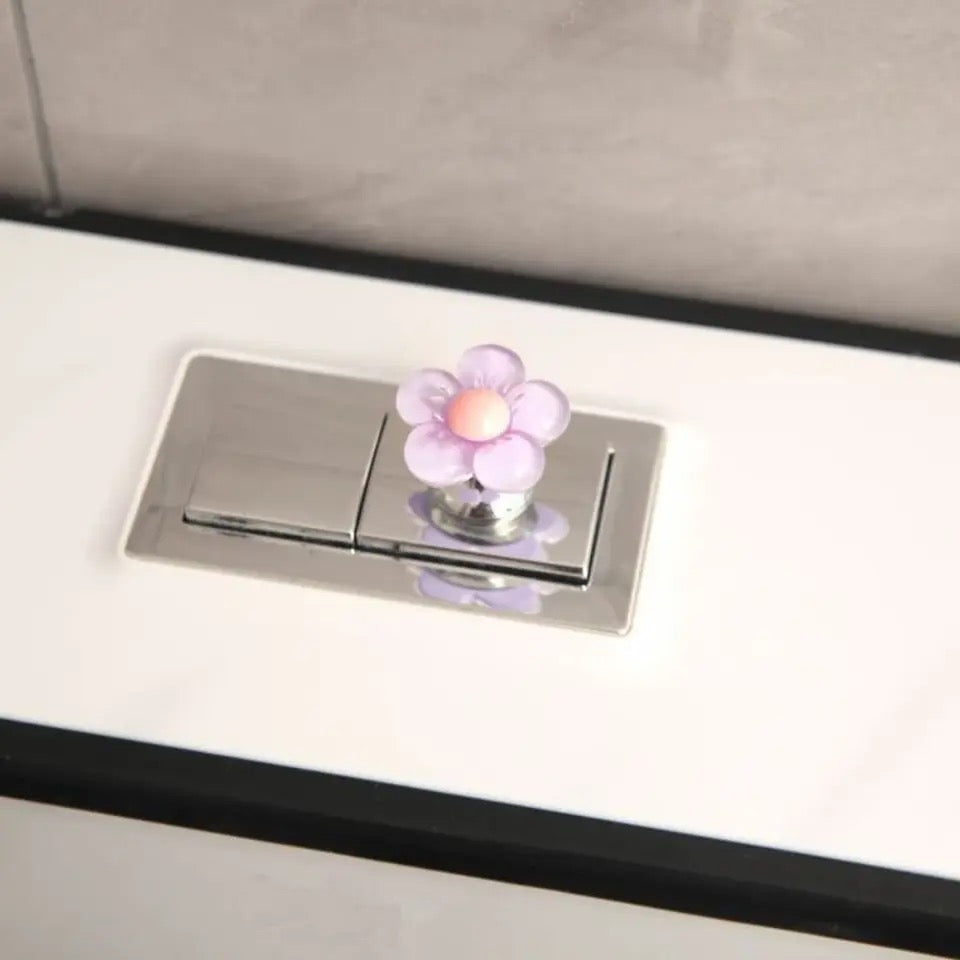 Botón de inodoro en forma de flor
