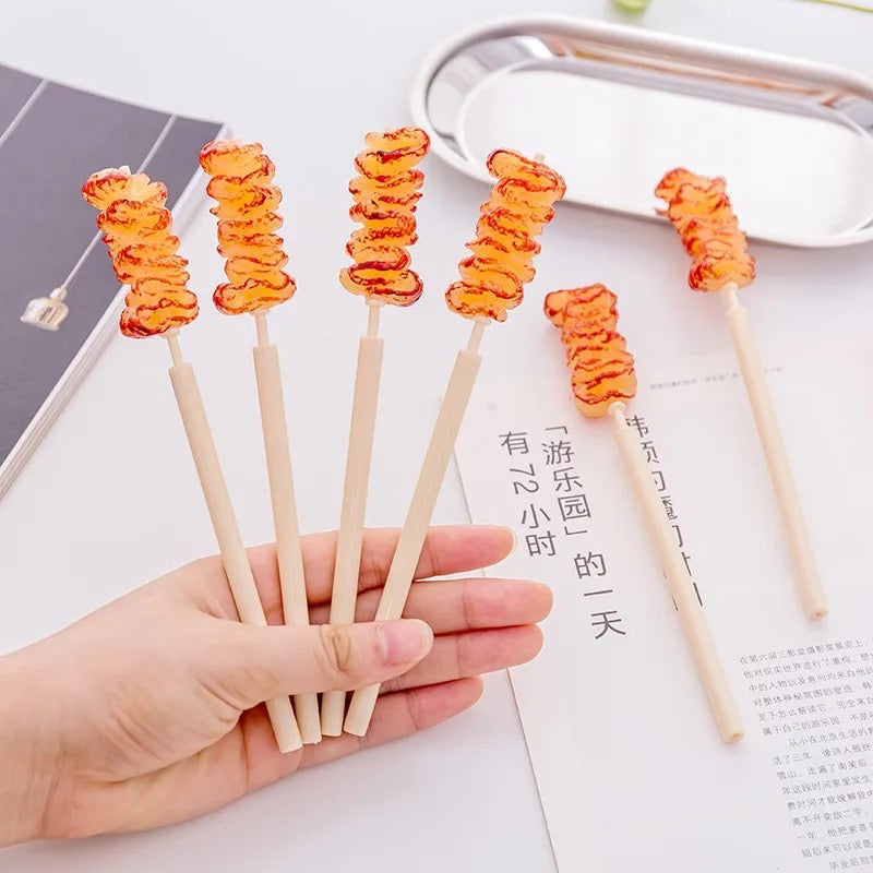 Lapicero en forma de brocheta