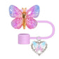 Protector de cañita mariposa  rosada y celeste y dije
