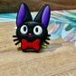Pin o Dije gatito negro con lazo rojo