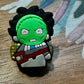 Dije o pin de masacre Texas
