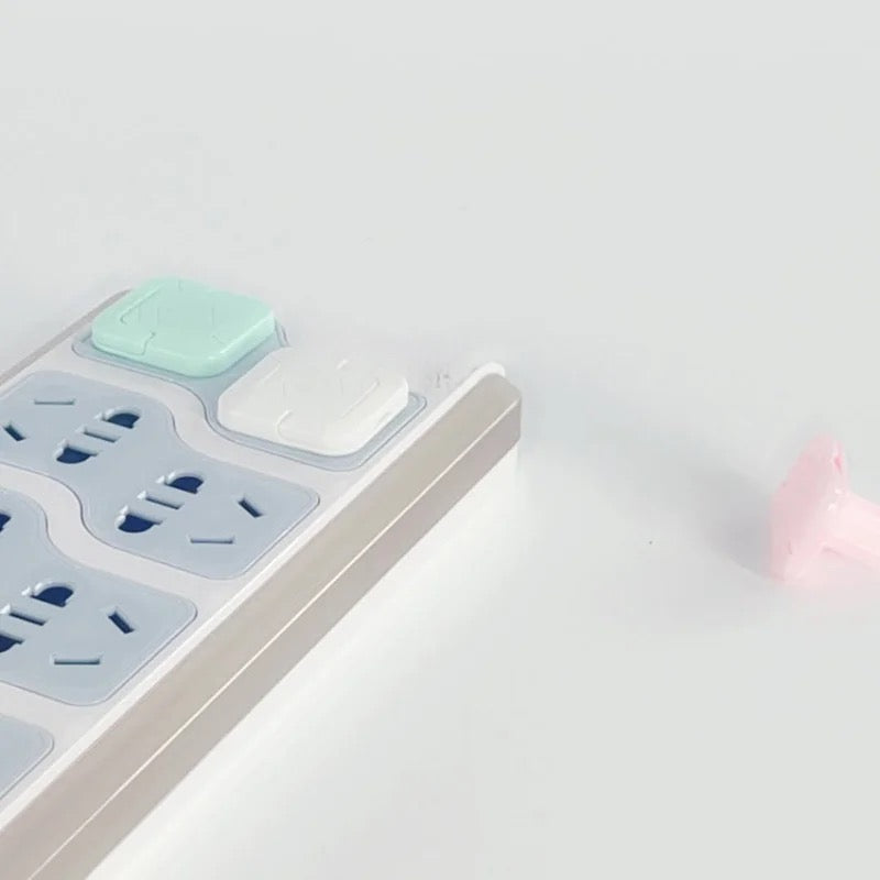 Cubierta o Protector  de Enchufe Mod 3 (Rosado-Verde)