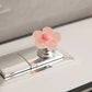 Botón de inodoro en forma de flor