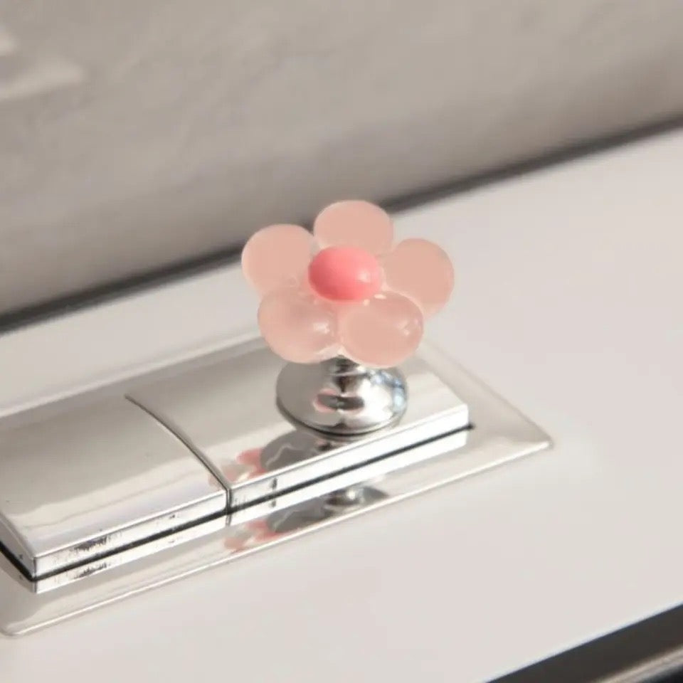 Botón de inodoro en forma de flor