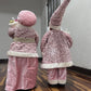 HERMOSOS PAREJA DE ADORNOS NAVIDEÑO ORO ROSA PAPÁ NOEL Y MAMÁ NOELA