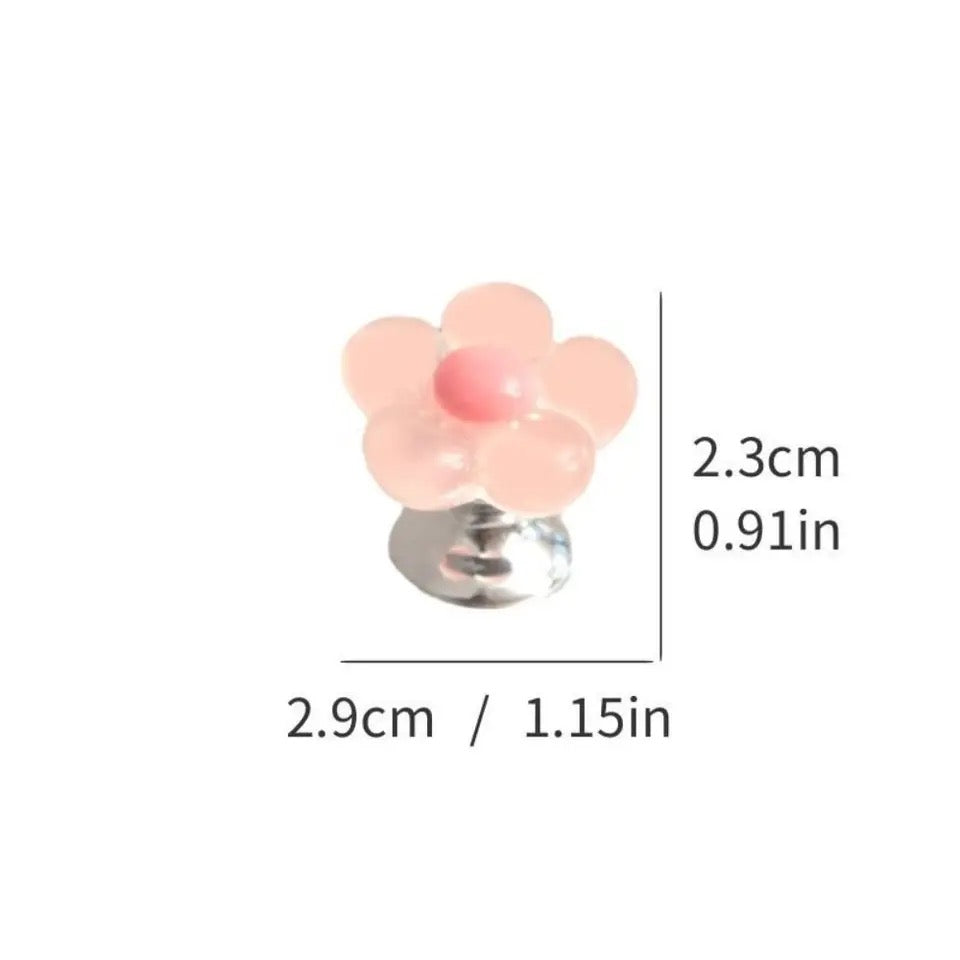 Botón de inodoro en forma de flor