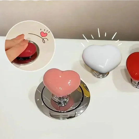 Botón de inodoro corazón