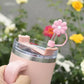 Protector de cañita flor. Rosa y incial