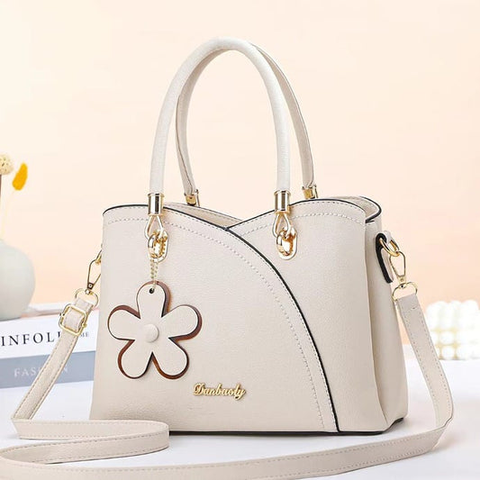 BOLSO DE CUERO RETRO CON LLAVERO FLOR