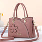 BOLSO DE CUERO RETRO CON LLAVERO FLOR