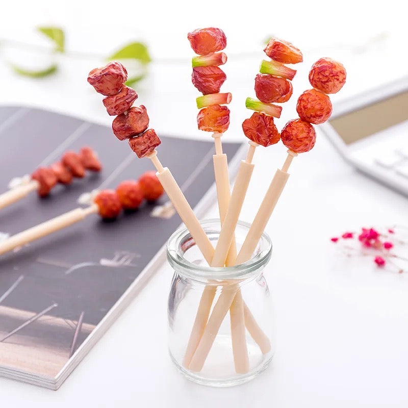 Lapicero en forma de brocheta