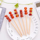 Lapicero en forma de brocheta