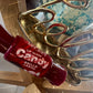 Brillo labial forma de caramelo